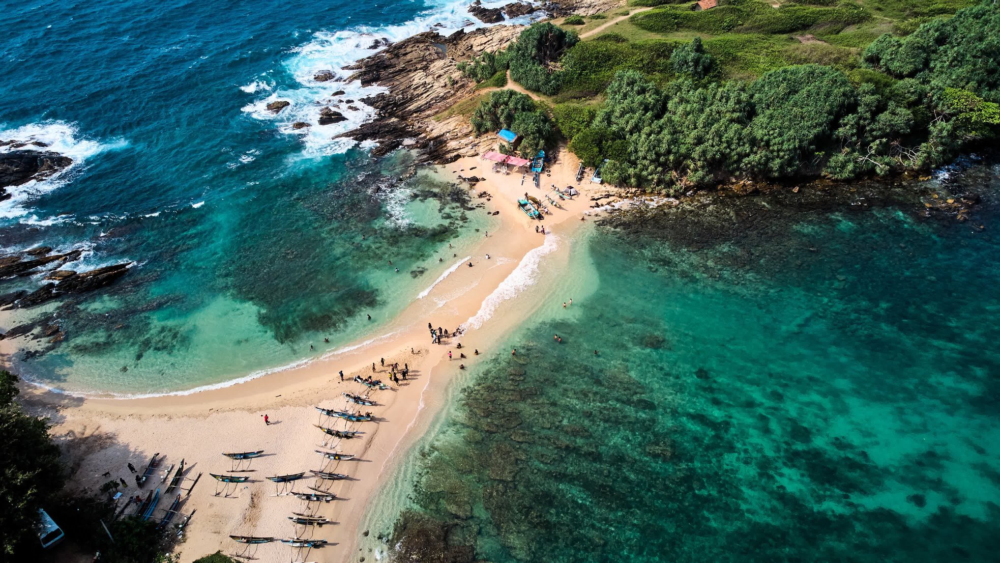 Aerial view of blue beach island. Drone view of the beaches of Sri Lanka